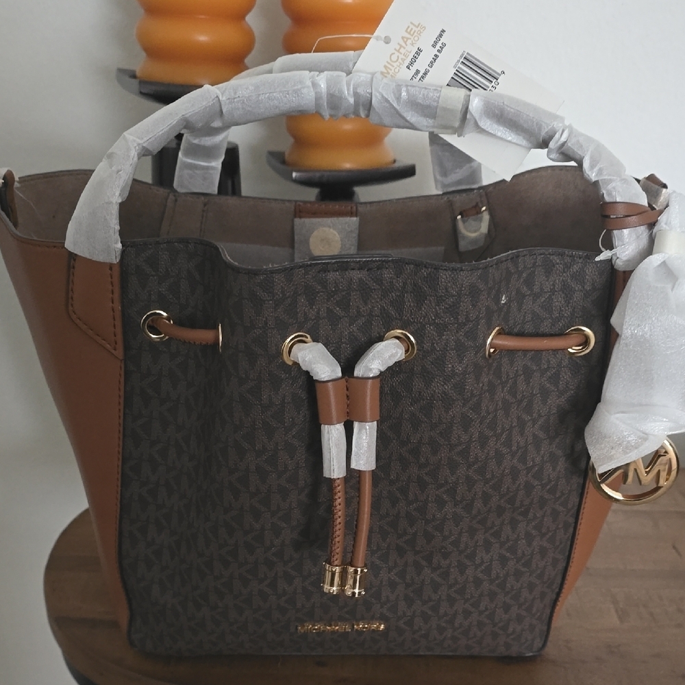 Michael Kors Brown Shoulder Bag with Gold Accents. Has Detachable Straps.